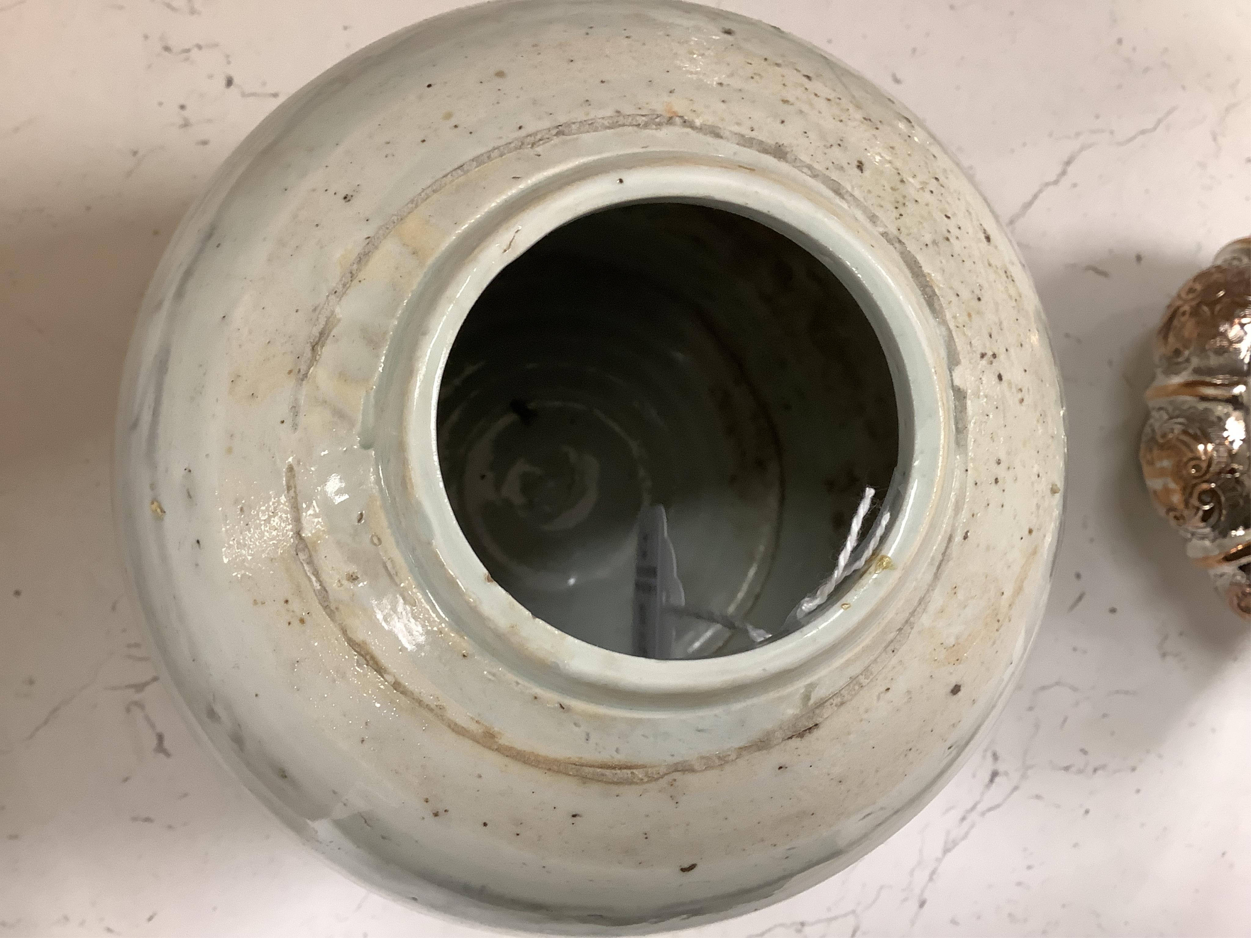 A 19th Century Chinese blue and white ‘precious objects’ plate, a jar and famille rose saucer, largest 23cm in diameter